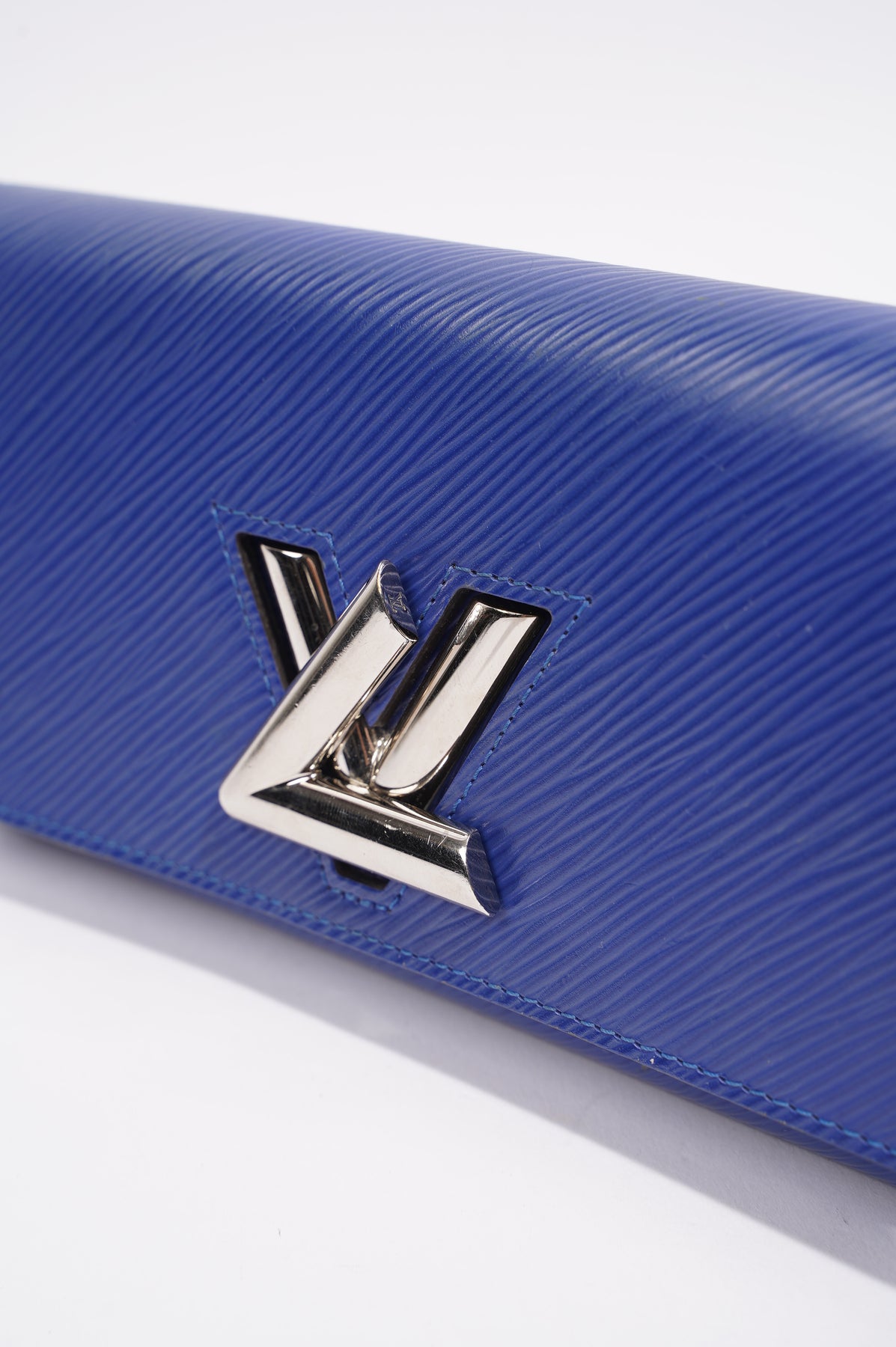 Twist leather wallet Louis Vuitton Blue in Leather - 36278429