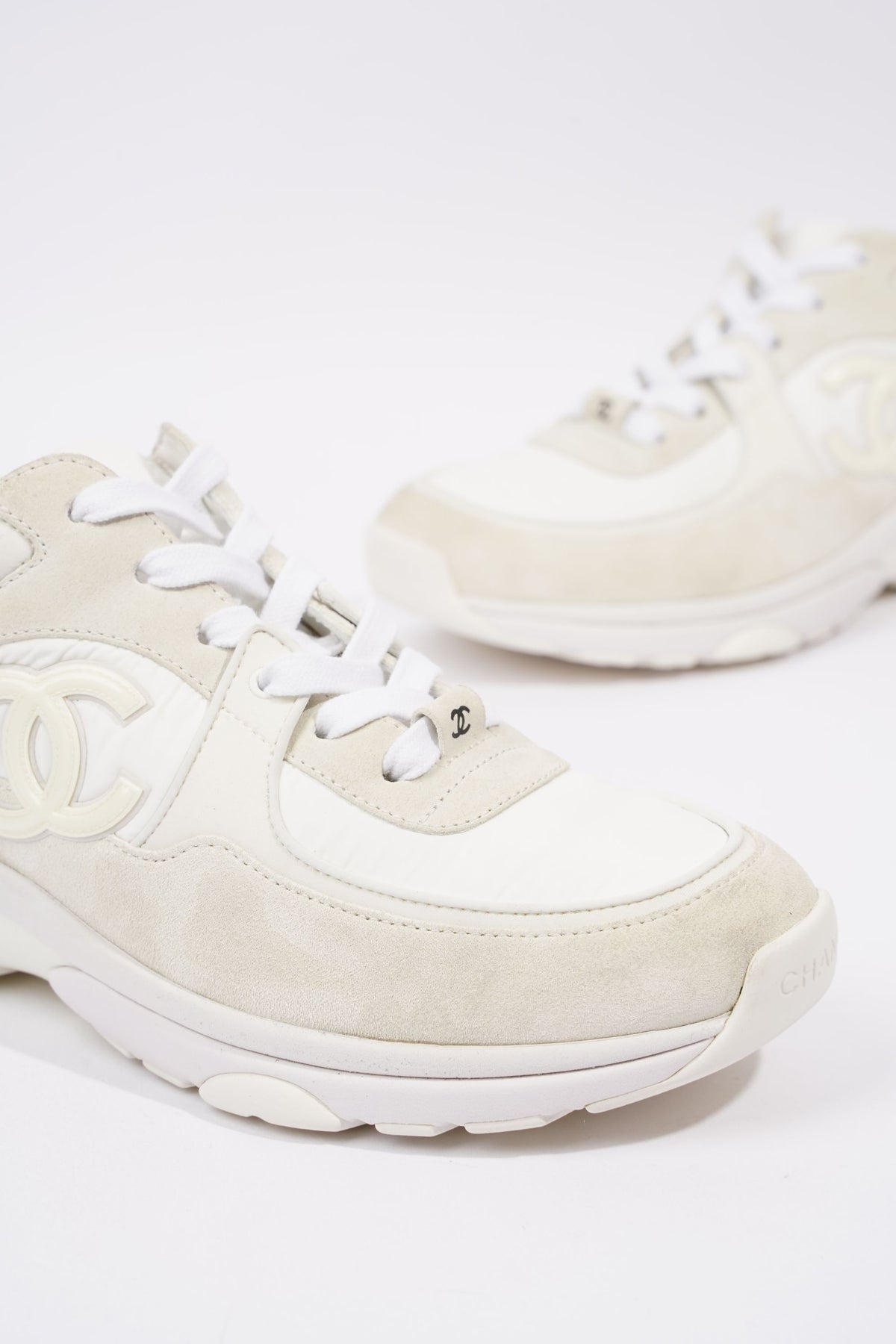 Womens white deals chanel trainers