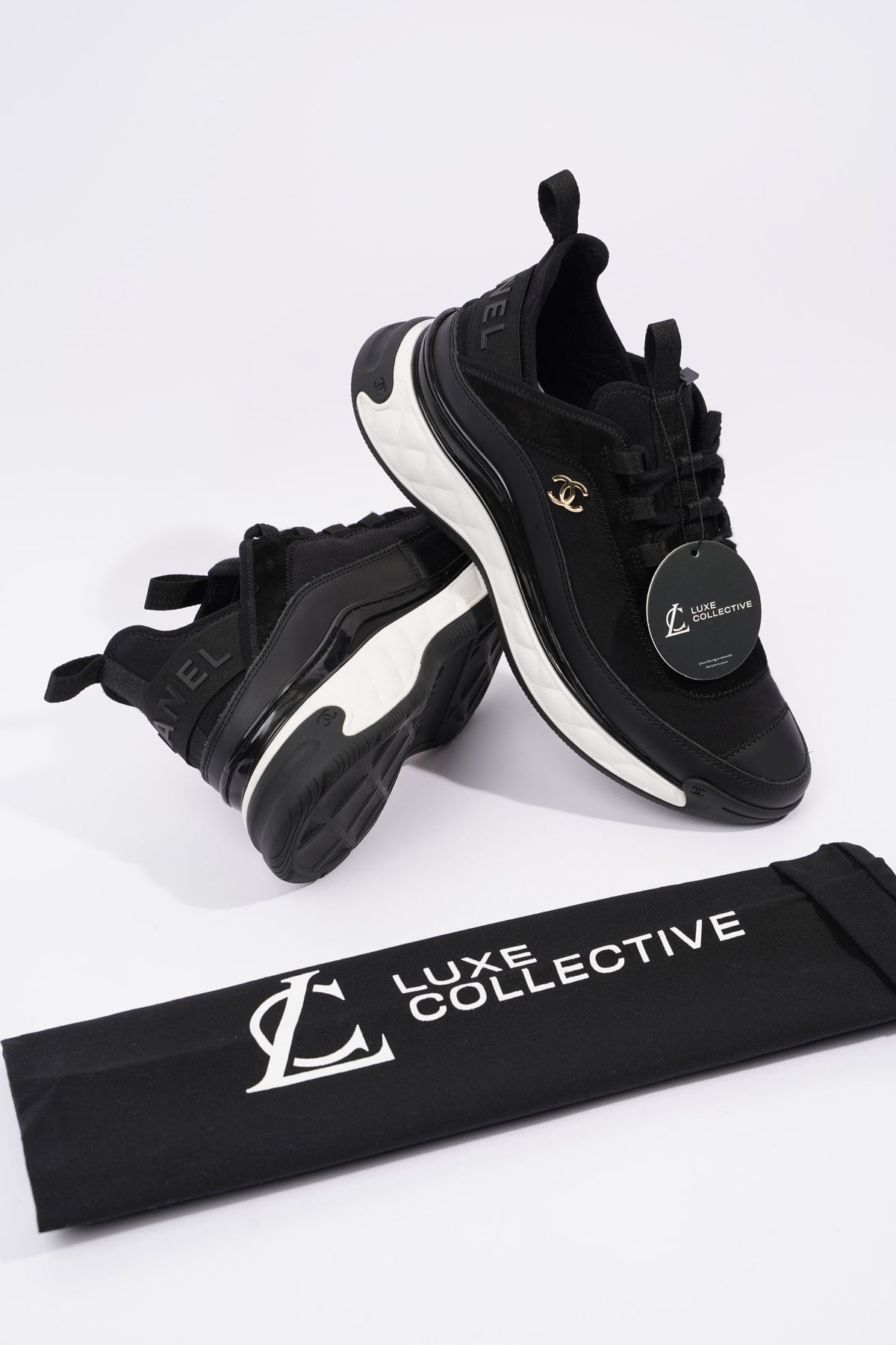 Chanel CC Logo Runners Black / White EU 40 / UK 7 – Luxe Collective