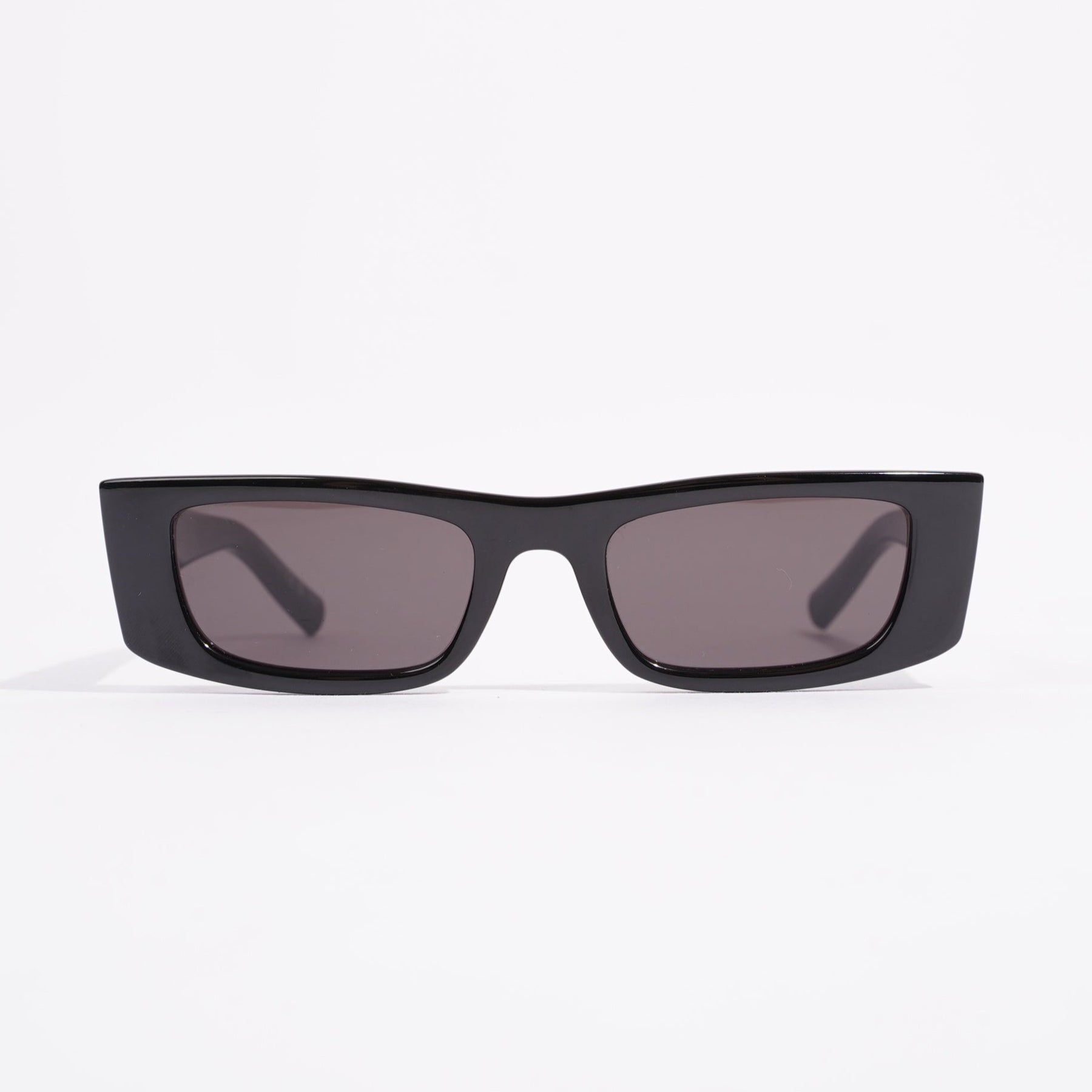 Gucci rectangular wrap-around sunglasses in black acetate.