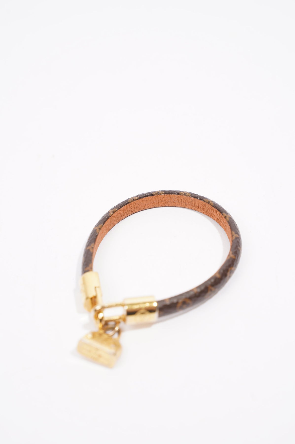 Louis Vuitton Alma Brown Canvas Gold Tone Charm Bracelet - ShopStyle