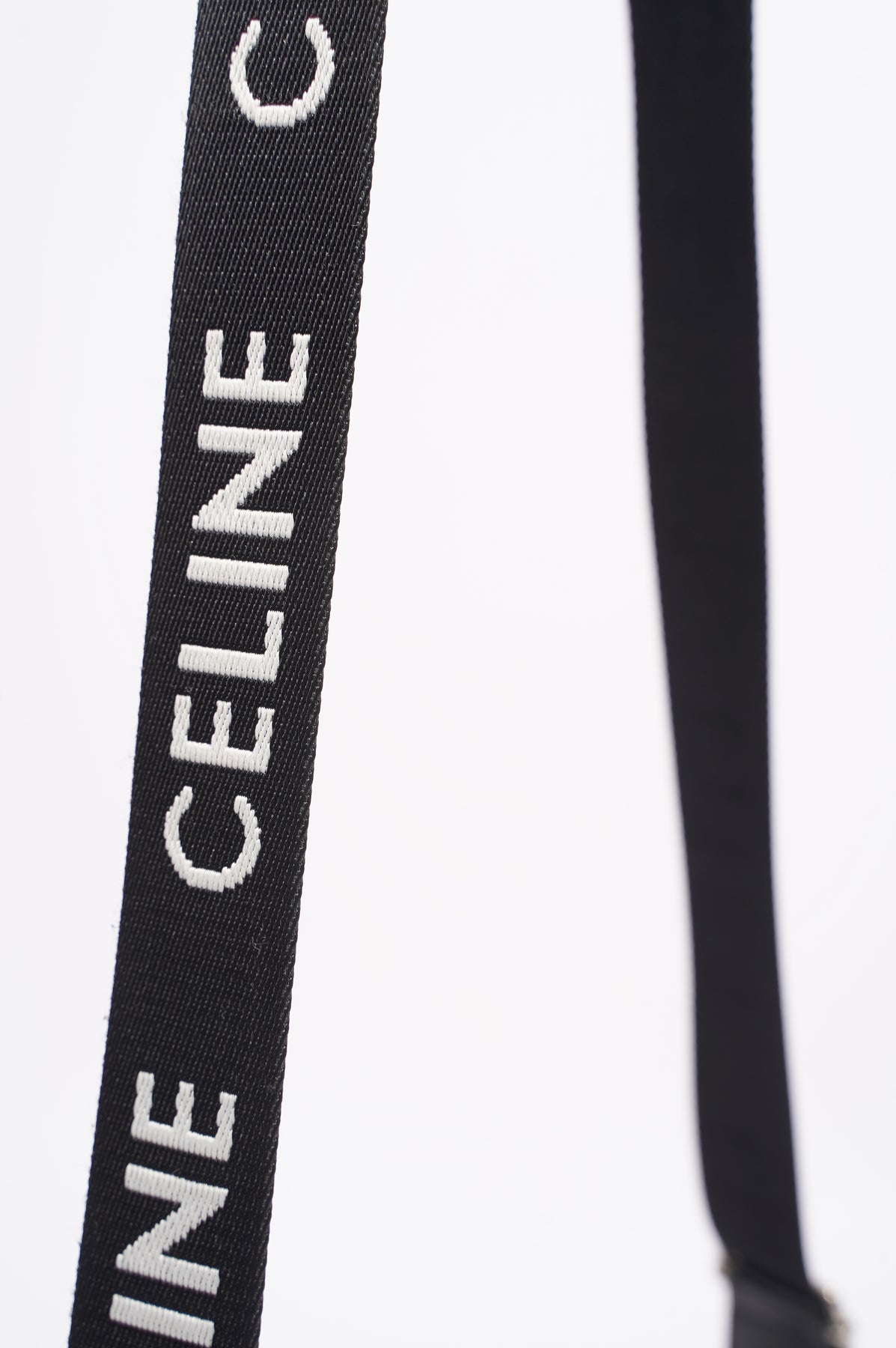 MEDIUM MESSENGER BAG IN TRIOMPHE CANVAS WITH CELINE PRINT - BLACK