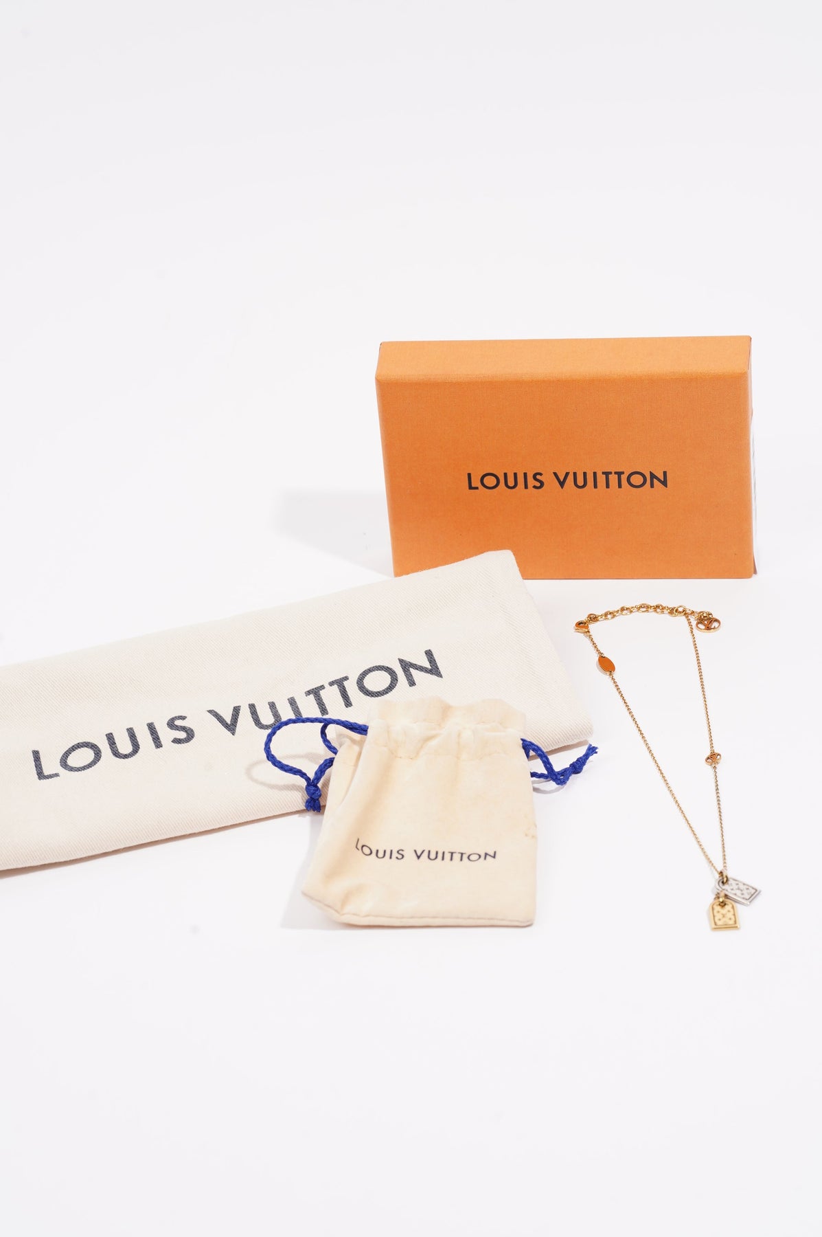 Louis Vuitton nano gram necklace name tag motif gold / Silva