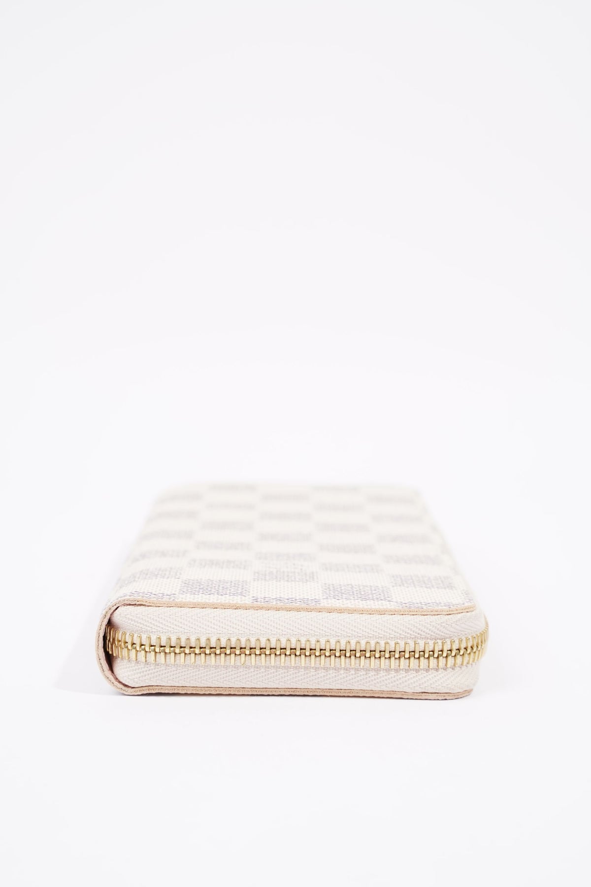 LOUIS VUITTON - CLEMENCE SLIMLINE ZIPPY WALLET DAMIER EBENE – RE.LUXE AU