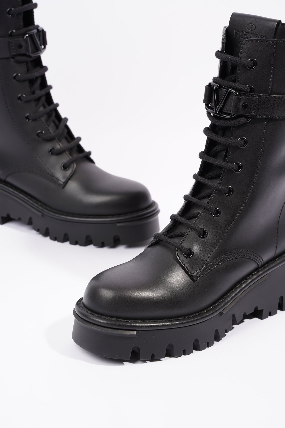 Valentino ruffle hot sale combat boots