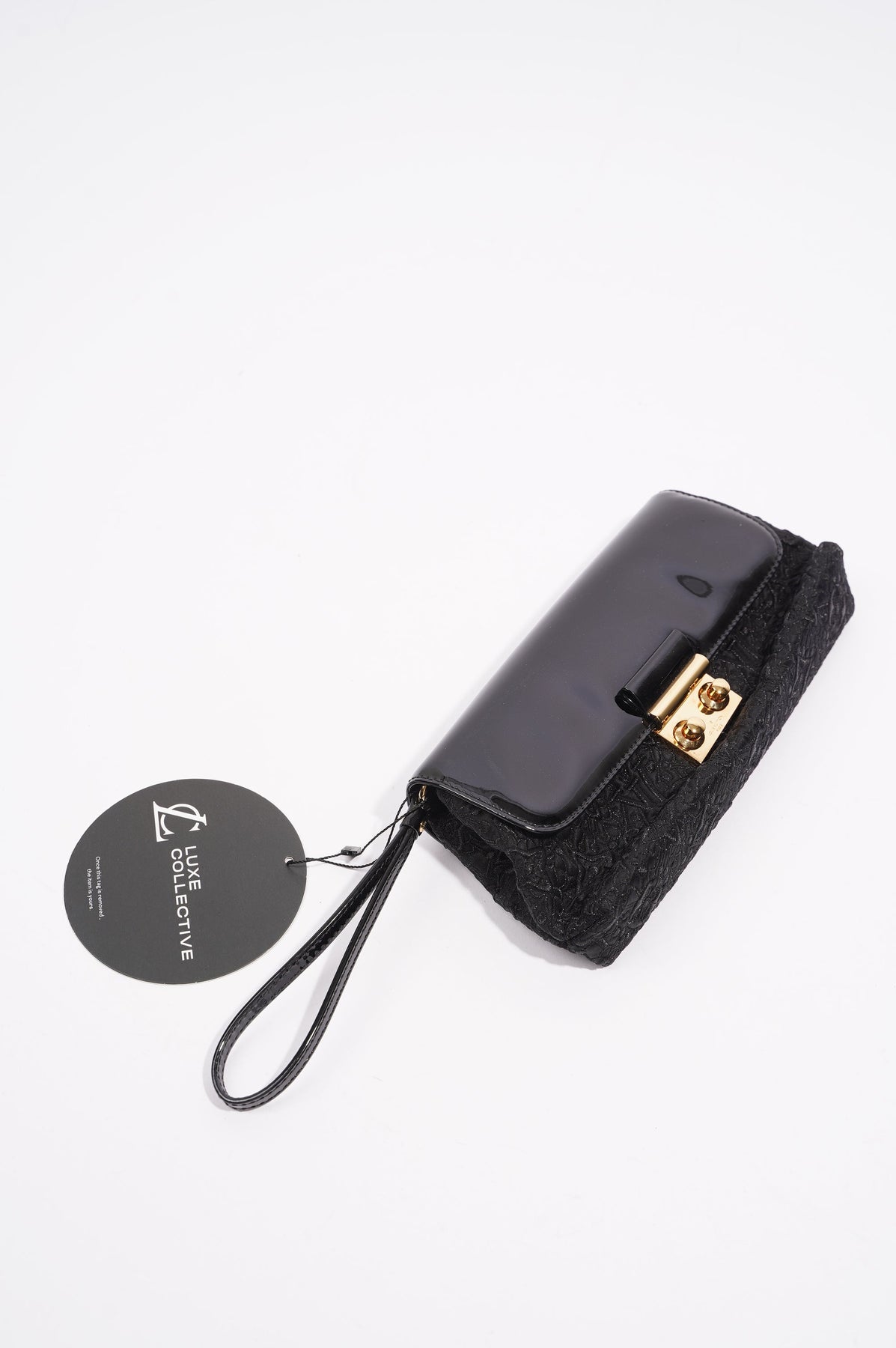 LOUIS VUITTON Slick Black Patent Leather Square Toe Cut Out Buckle Vam –  The Paper Bag Princess Vintage