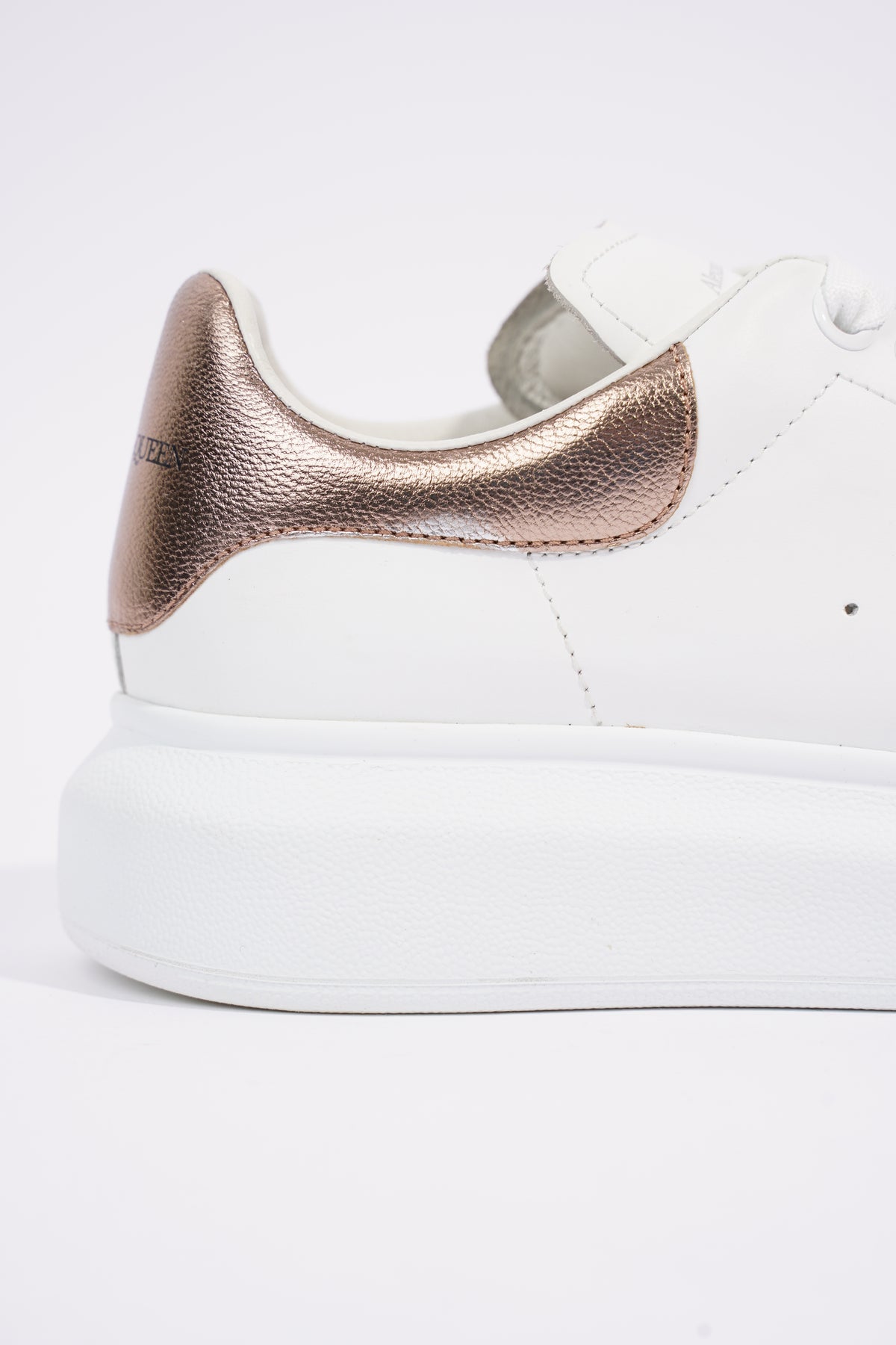 Alexander mcqueen clearance rose gold trainers