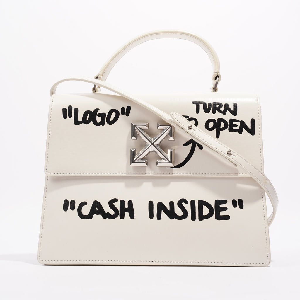 Logo turn to deals open cash inside bag