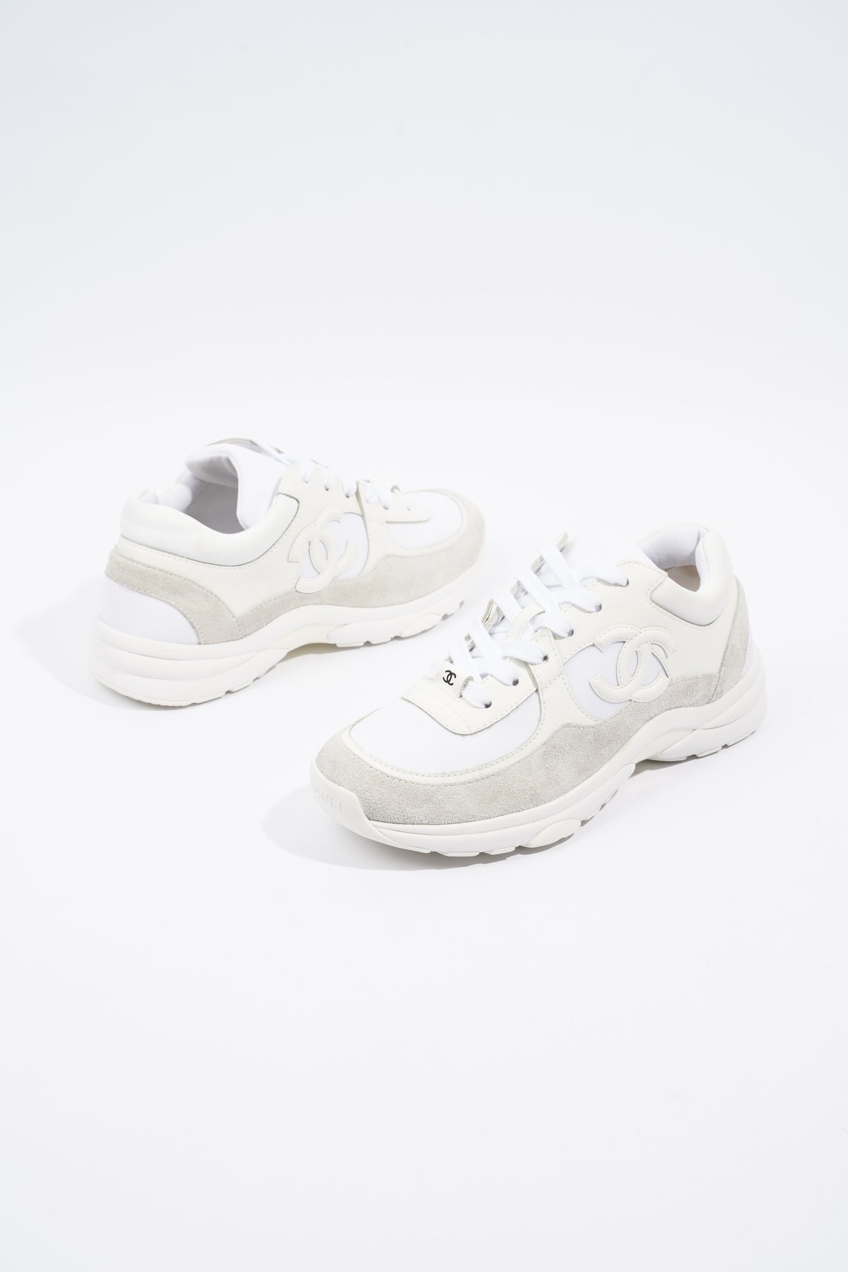 Triple white deals chanel sneakers