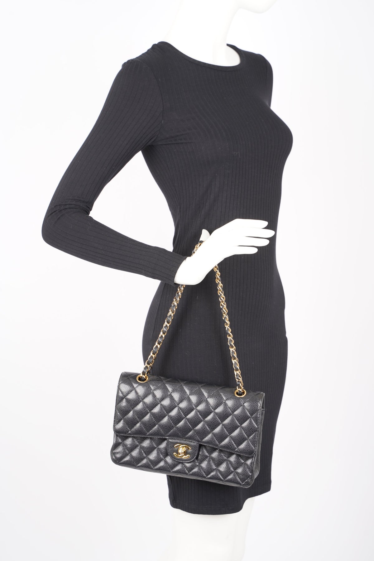 Chanel Black Quilted Caviar Medium Classic Double Flap Bag – Madison Avenue  Couture