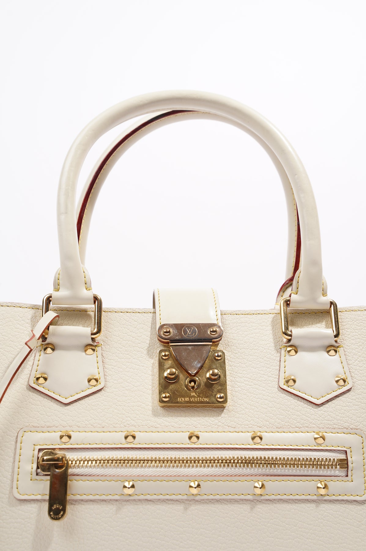 Authentic Louis Vuitton White Studded Suhali Leather Le Fabuleux Bag.