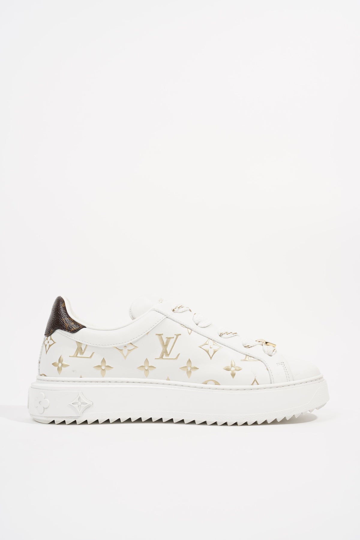 Louis Vuitton® Time Out Sneaker Gold. Size 36.0